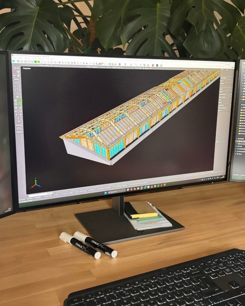 Écran d’ordinateur affichant une modélisation 3D détaillée d’une structure en bois